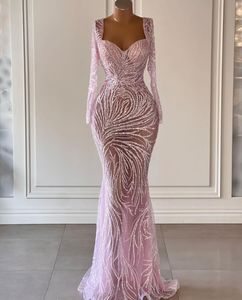 Robes de bal sirène rose manches longues col en V dentelle 3D creuse appliques sexy paillettes scintillantes perlées longueur de plancher robes de soirée de célébrité, plus la taille sur mesure