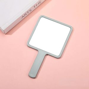 Pink Mirror Handheld Het perfecte accessoire voor dagelijkse cosmetische make -up met een schattige kleine draagbare vierkante vorm handheld spiegel in 2024