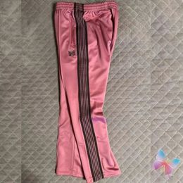 Roze naalden zijkant strepen geborduurde vlinder Hiphop Street Casual Loose Track Men Women Drawring Sports broek 240420