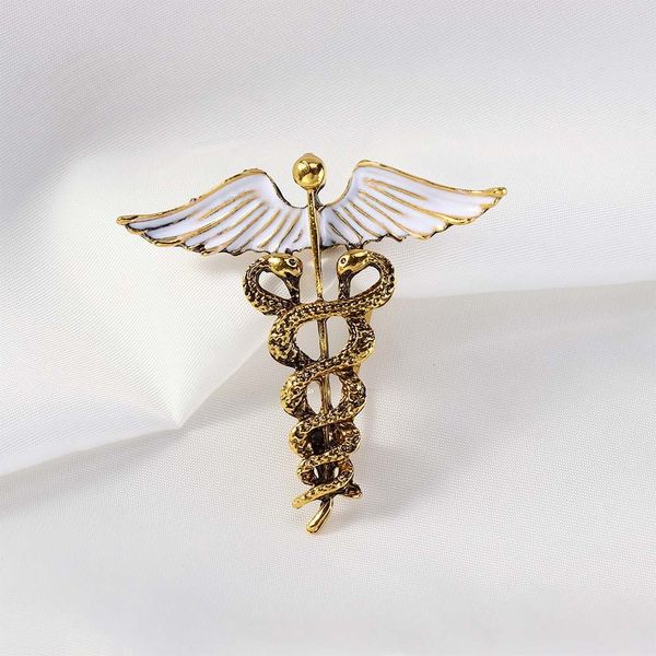 Broches de alfileres ala de caduceo de cristal con insignia de serpientes Pin de solapa símbolo de medicina regalos de joyería para enfermera Doctor estudiantes 230621