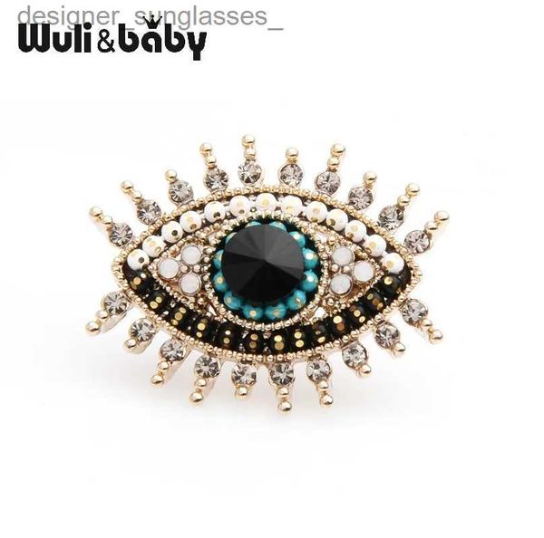 Broches broches Wuli bébé petit strass noir bleu oeil broches femmes alliage simulé perle oeil collier broches cadeaux L231117