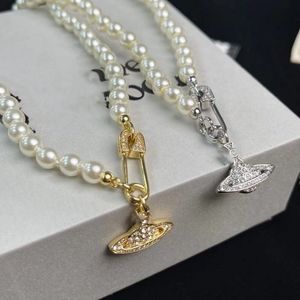 Collier de perles de styliste planète, pendentif trombone à la mode, bijoux d'amour