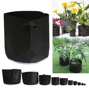 Planters potten pc's niet geweven boomstofweefsel kweekzak wortel container planten zakje zwarte hand met planten bloemen groeit zaailing bloempotplant