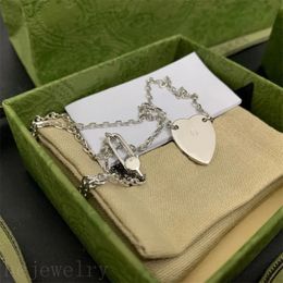 Vergulde glod hart kettingen mannen sieraden ontwerper voor vrouwen paren stijl punk vakantie geschenken kleurrijke metalen oorbellen studs klassieke moderne stijl C23