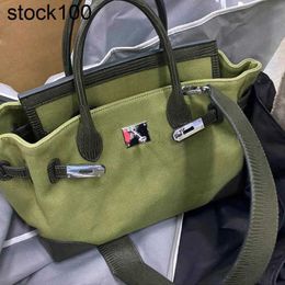 Platinum Handbag Canvas Bag 2024 Automne et niche féminine d'hiver Ins One épaule Military Green Crossbody portant le cuir authentique fait à la main