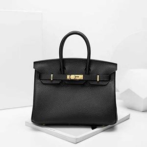 Platinum Luxury's Handtas Lederen Top Bag 2024 Huishoudelijke dames grote capaciteit Layer Litchi Graan Crossbody Dames