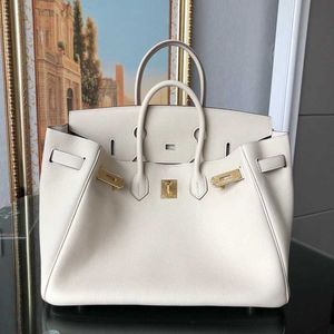 Platinum Luxurys Lederen Top Handtas Tas 35 pakjes koeienhuid op de laag Wit 2024 Hoge capaciteit Echte dames high-end feel draagbaar