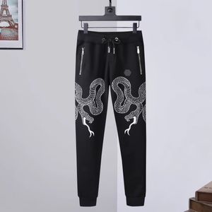 PLEIN BEAR Pantalons pour hommes JOGGING TROUSERS STONES GOTHIC PP Skulls Hommes Femmes Pantalons Sports Designers de luxe Pantalons de survêtement Cordon Joggers Couple Marque Vêtements 84603