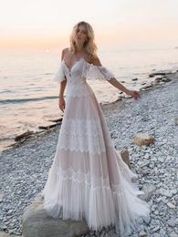 Plus taille une ligne robes de mariée robes nuptiales v plage plage boho blanc sexy en dentelle appliquée