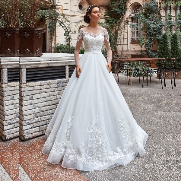 Vestidos de novia de Organza de talla grande con un vestido de boda de cuello transparente con manga de ilusión larga para novia