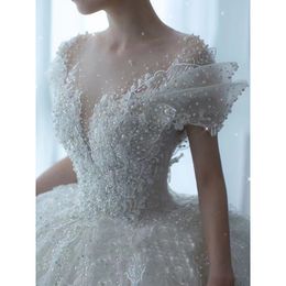 Robes de mariée de taille plus grande