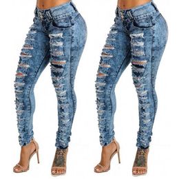 Plus size ademende knoop skinny denim voeten broek hoge taille noodlijdende gescheurde jeans dames