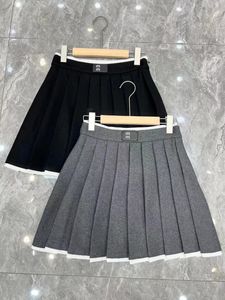 Plus size jurken 2023 Nieuwe zwarte sexy street casual designer rokken dameshoge metaal met dames om licht uit minirok te voorkomen