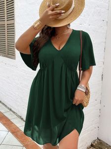 Robes grande taille Grande taille 4XL robe tunique verte femmes été demi manches Mini robes en maille dames élégantes grands vêtements amples 230511