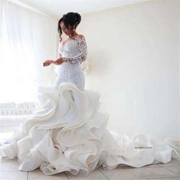 Plus taille de mode de mode robe de mariée arrivée dentelle en dentelle à manches longues vestido musulman de noiva appliques romantiques robes de volants 0509