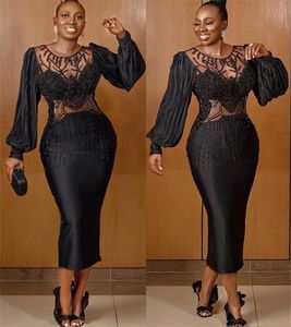 Grande taille Sexy arabe Aso Ebi noir robes de bal perlée col transparent longueur de thé soirée formelle fête deuxième réception robes