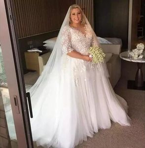 Plus La Taille Robes De Mariée 2017 Vraies Photos Dentelle Sheer V Cou Demi Manches Tulle Tribunal Train Longues Robes De Mariée Sur Mesure Chine EN11065