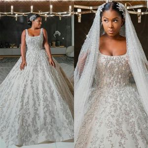 Robes de mariée grande taille 2020 nouvelle encolure dégagée dentelle perlée robes de mariée africaines de luxe robes de mariée avec longue traîne