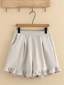 Vêtements de femme plus taille pour femmes Shorts de taille élastique d'été garniture plissée au bas de la jambe Minon Nonetch Solid 240420