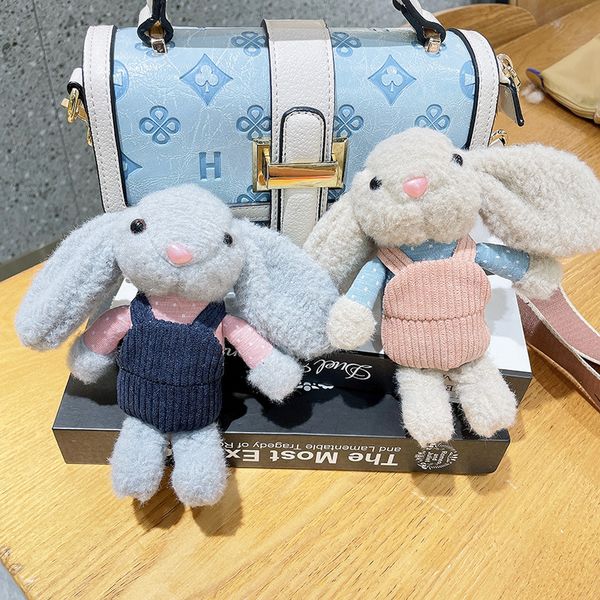 Peluche lapin sac d'école pendentif stalle poupée vente en gros année du lapin poupée voiture porte-clés en peluche jouet