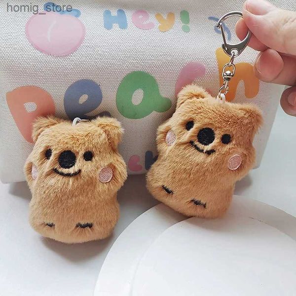 Keychains en peluche 1pcs grincement petit ours brun en peluche jouet mini-ours poupée jouet sac de trèflé