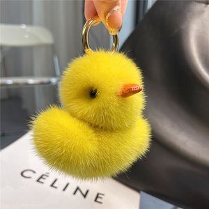 Porte-clés en peluche Highend mignon canard jaune réel vison fourrure porte-clés femmes sac pendentif à breloque voiture porte-clés en peluche ornements enfants jouets cadeau d'anniversaire 230921