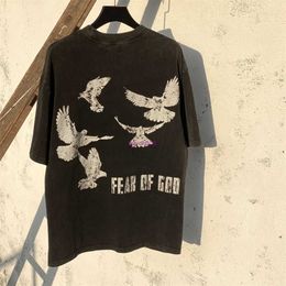 T-shirts Pnrn Mens Saint Michael Holding Rose Co Brandhed Fog White Pigeon Print High Street Wash Vintage T-shirt à manches courtes Summer