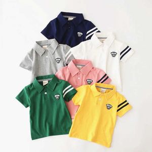 Polos Polos Summer Boys Polo Shirt Korte mouwen Zeven katoenen kinderen Kleding Mode Girls Top Jeugdsportshirt WX5.29