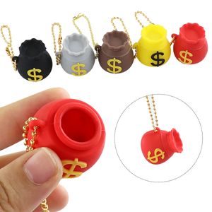 Conception populaire sac d'argent forme conteneur en caoutchouc de silicone pots de boîte en gros avec différentes couleurs 8 ml de capacité avec porte-clés pour étui de cire