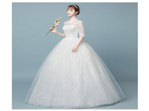 Robe de mariée à col haute à manches populaires broderies simples robes de mariée en dentelle sans dossier 3901085