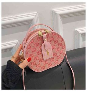 Petit sac populaire minorité féminine nouvelle fronde sac de messager à bandoulière portable gâteau rond sac à main