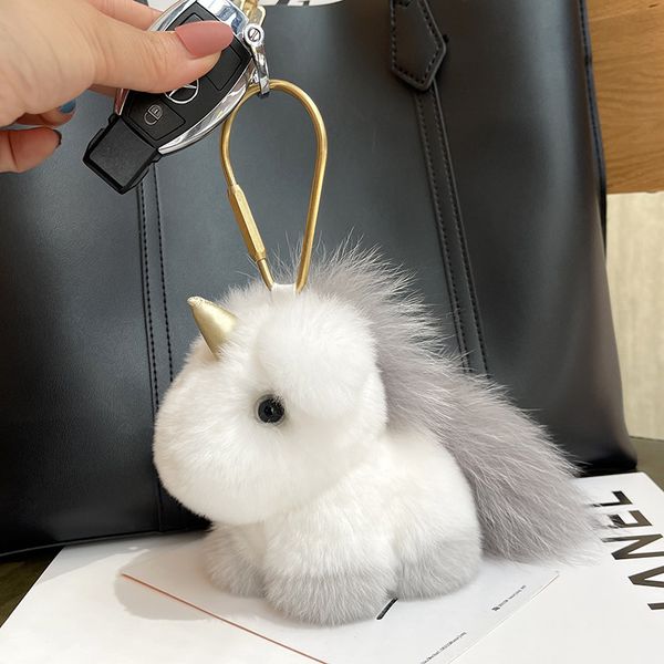 Popular unicornio llavero de pelaje de pelaje de pelaje de peluche para bolsas de moda de amortiguación de los regalos para niñas para niñas para mujeres peludas llave llave hebilla