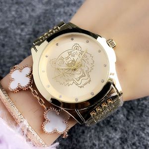 Popular reloj de pulsera estilo tigre relojes marca mujer chica banda de acero reloj de cuarzo K02