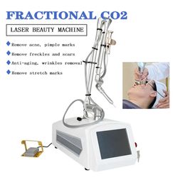 Machine laser fractionnée CO2 portable 10600nm, cosmétique, resurfaçage de la peau, cicatrices d'acné, resserrement vaginal, matrice de points, radiofréquence, rajeunissement de la peau