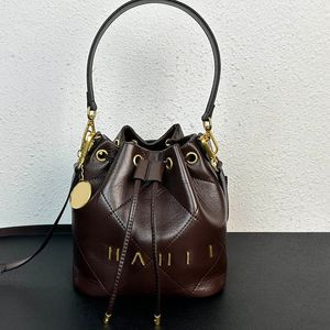 Mini bolso de cubo portátil para mujer, bolso de lujo acolchado de cuero de vaca con cordón, bolso de hombro clásico vintage, herrajes dorados, bolso cruzado de diseñador, maleta 21CM