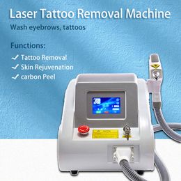Q Switch portátil Nd Yag Eliminación de tatuajes con láser 1064nm 532nm 1320nm Máquina de belleza Ceja Eliminar Carbon Peeling Tratamiento de cicatrices de acné Peca Pigmento Removedor de manchas