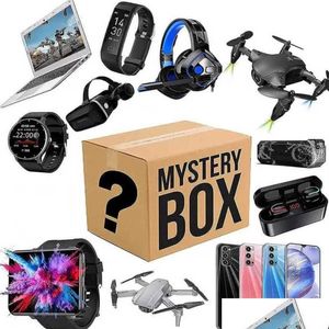 Haut-parleurs portables Mystery Box Electronics Boîtes aléatoires Cadeaux surprise d'anniversaire Chanceux pour les Adts tels que Bluetooth Head3211 Drop Deliver Dhpmv