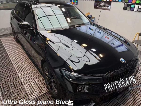 Etiqueta adhesiva de vinilo negro piano ultrabrillante premium Envolturas para todo el automóvil Película de cobertura con liberación de aire Pegamento inicial de baja adherencia Lámina autoadhesiva 1.52x20m 5X65ft