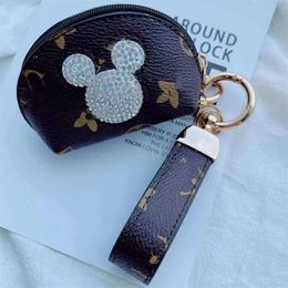 Presbyopie Keychain Buckles Clés de voiture Sac de porte Key Anneau de touche mignon Brown Flower Souris Pu Leather Cavyring Pendentif Fashion DES208O