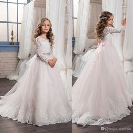 Prinses roze tule bloem meisjes jurken voor bruiloften lange mouw kanten kinderen eerste communie jurk met kristal sjerp goedkope pageantjurken