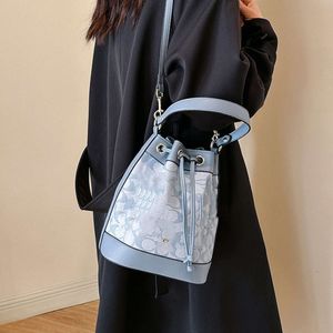 sac à cordon imprimé sac se godet féminin d'été de la mode de commerce extérieur texture niche épaule simple sacs à bandoulière