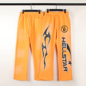 Matériau polaire imprimé hommes femmes pantalons de survêtement taille élastique cordon de serrage pantalon Orange pleine longueur