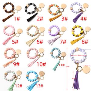 Perles de silicone imprimées porte-clés pour clés bracelet de perles en bois porte-clés avec gland femmes hommes mode puces en bois porte-clés en gros