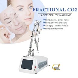 Machine laser CO2 fractionnelle professionnelle élimination des vergetures cicatrice traitement des rides Tube métallique RF dispositif de resurfaçage de la peau