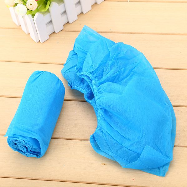 Promotion 100 pcs/lot couvre botte de chaussure jetable ménage Non-tissé bottes anti-dérapant Galosh empêcher la couverture de chaussures humides