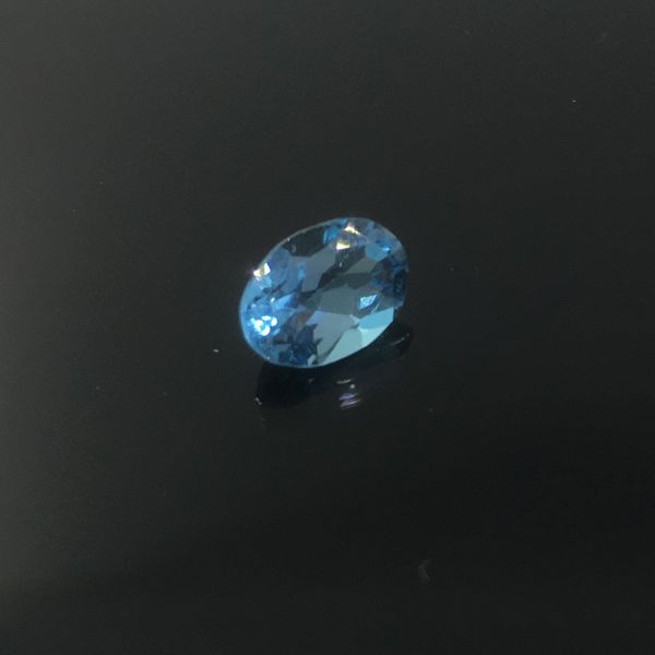 Promoción topa calidad azul claro topacio natural piedra preciosa suelta para anillo arete o colgante 5 mm * 7 mm el peso es 0.6 ct intrépido piedra topacio