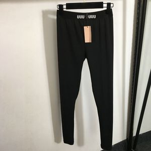 Pantalones Legging negros para mujer, mallas deportivas de diseñador de lujo para Yoga, cintura elástica, pantalones para correr de ocio