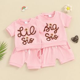 Pudcoco Meisjes Zomer 2 Stuks Shorts Sets Korte Mouw Brief Bloem Borduren Tops Effen Kleur Zus Bijpassende Outfits 240313