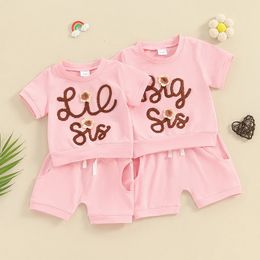 Pudcoco Girls Summer 2pcs Shorts Sets Sets korte mouwbrief Bloem borduurwerk Tops Solid Color Sister Matching Outfits 240314