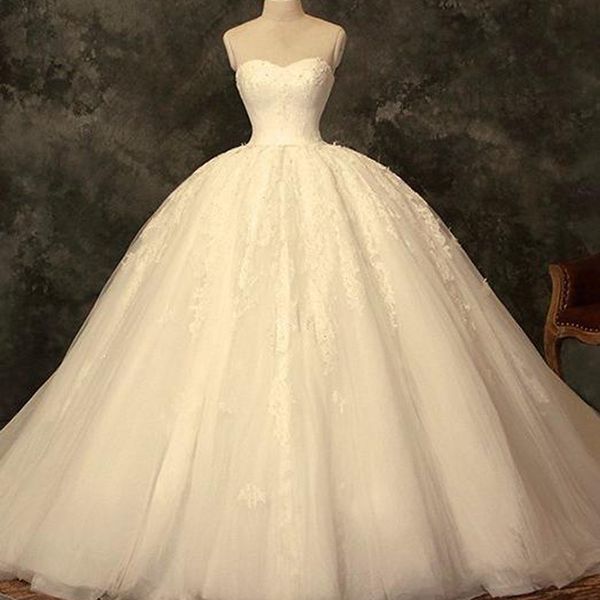 Robe de mariée bouffante robe de mariée chérie sans manches grandes robes de mariée perles dentelle Appliques Tulle longueur de plancher robe de mariée avec jupon